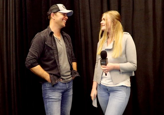 Abby Courtland interviewing Lucas Hoge.
