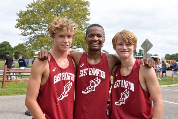 Sophomore Bonackers, from left, Evan Masi, Amari Gordon and Colin Schaefer, who won the sophomore 5K at the Jim Smith Invitational on Saturday.