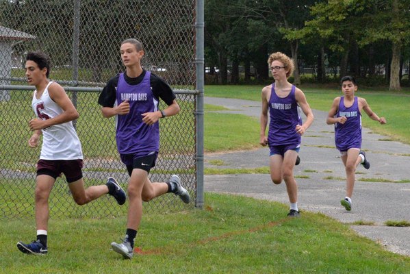The Baymen head out at the start of the their host Peconic Invitational at Red Creek Park on Thursday, September 5.