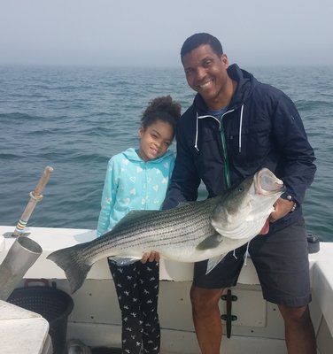 Striped bass fishermen are debating how best to reduce the number of fish they kill each year to help the species rebuild.