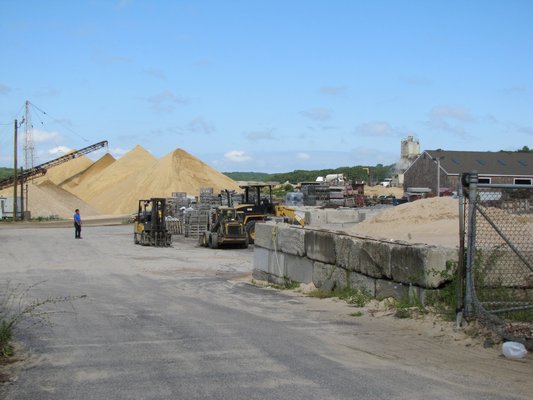 Bothh East Hampton and Southampton towns are working on laws that would allow them to require water testing in and around sand mines within the townships.