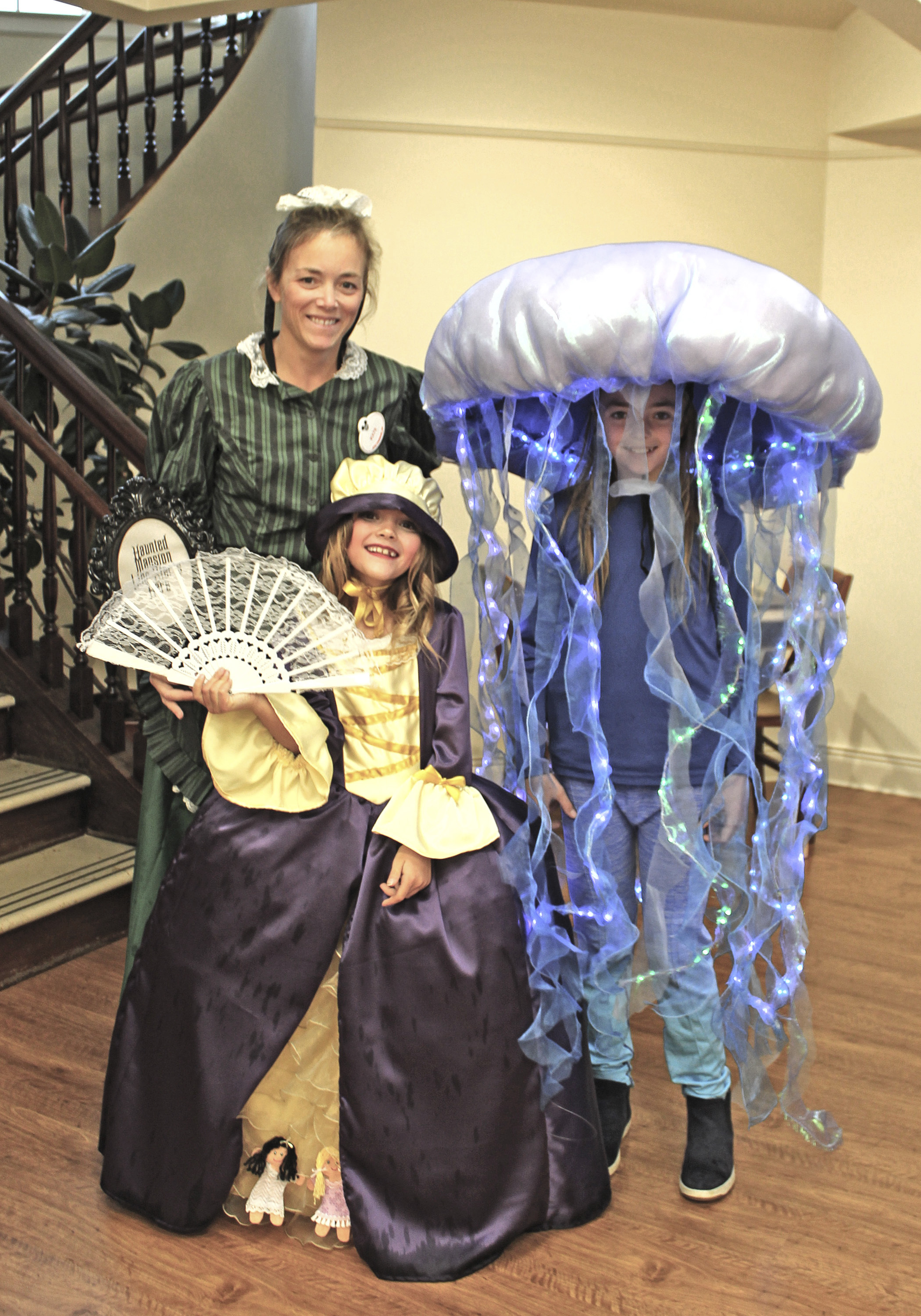 The annual Southampton Chamber ragamuffin parade was relocated to the Rogers Memorial Library on Sunday due to inclement weather. Kate, Violet and Sabrina McManus show their Holiday spirit. TOM KOCHIE