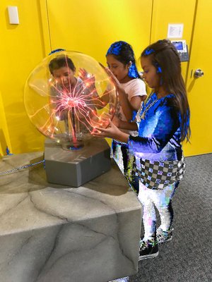 Bridgehampton School fourth-grades Hector Alvarez, Lesly Tlapanco and Olivia LaSerna on a field trip to Brookhaven National Lab.