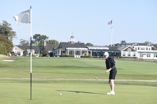 Southampton's Dan McDonnell putts on the first hole at Westhampton Country Club.
