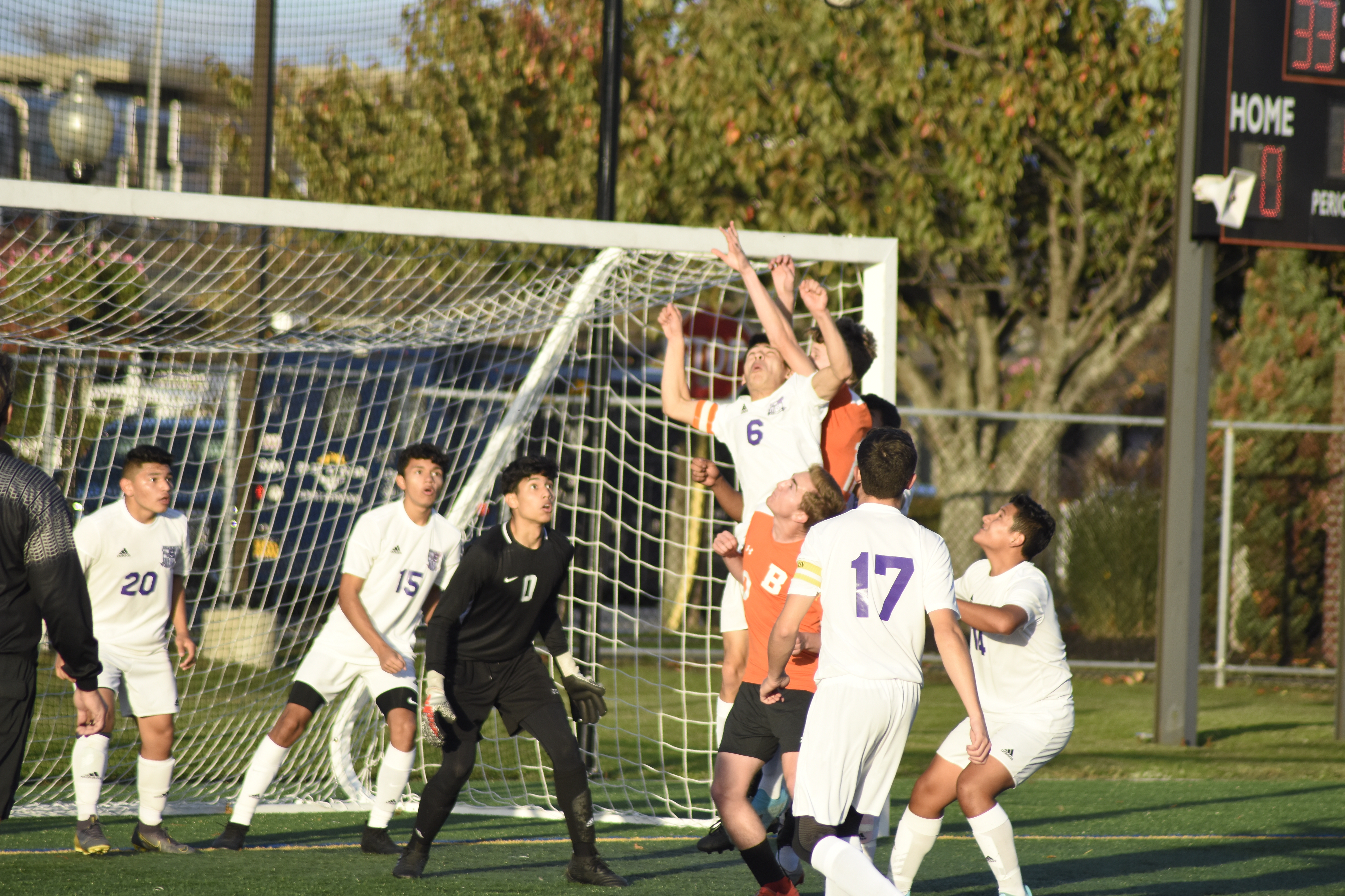 Hampton Bays senior Milan Moraga goes up and tries to clear a corner kick. The Baymen could not clear the ball, leading to the lone goal of the game.