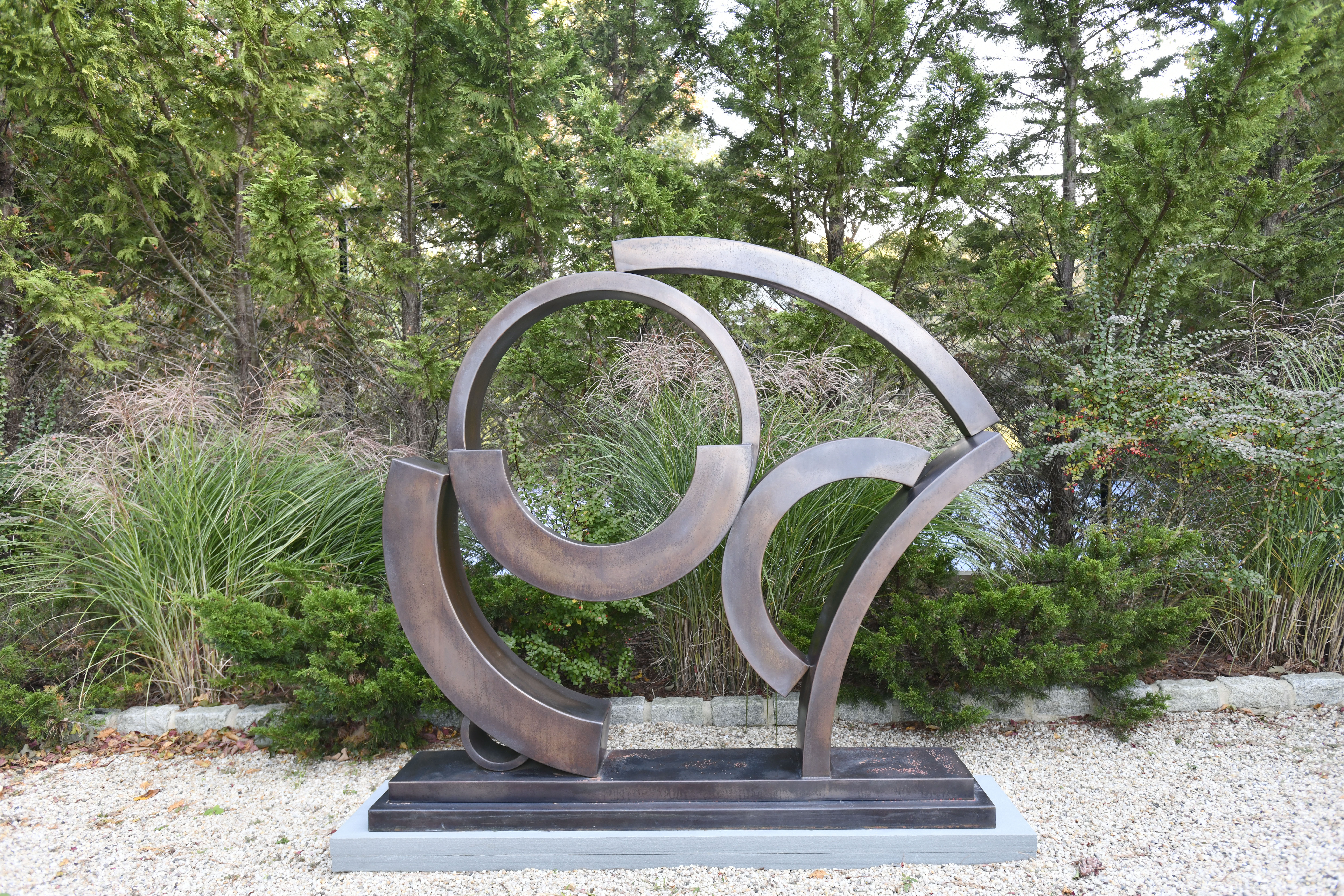 A large sculpture by Los Angeles artist Guy Dill graces the driveway.   DANA SHAW