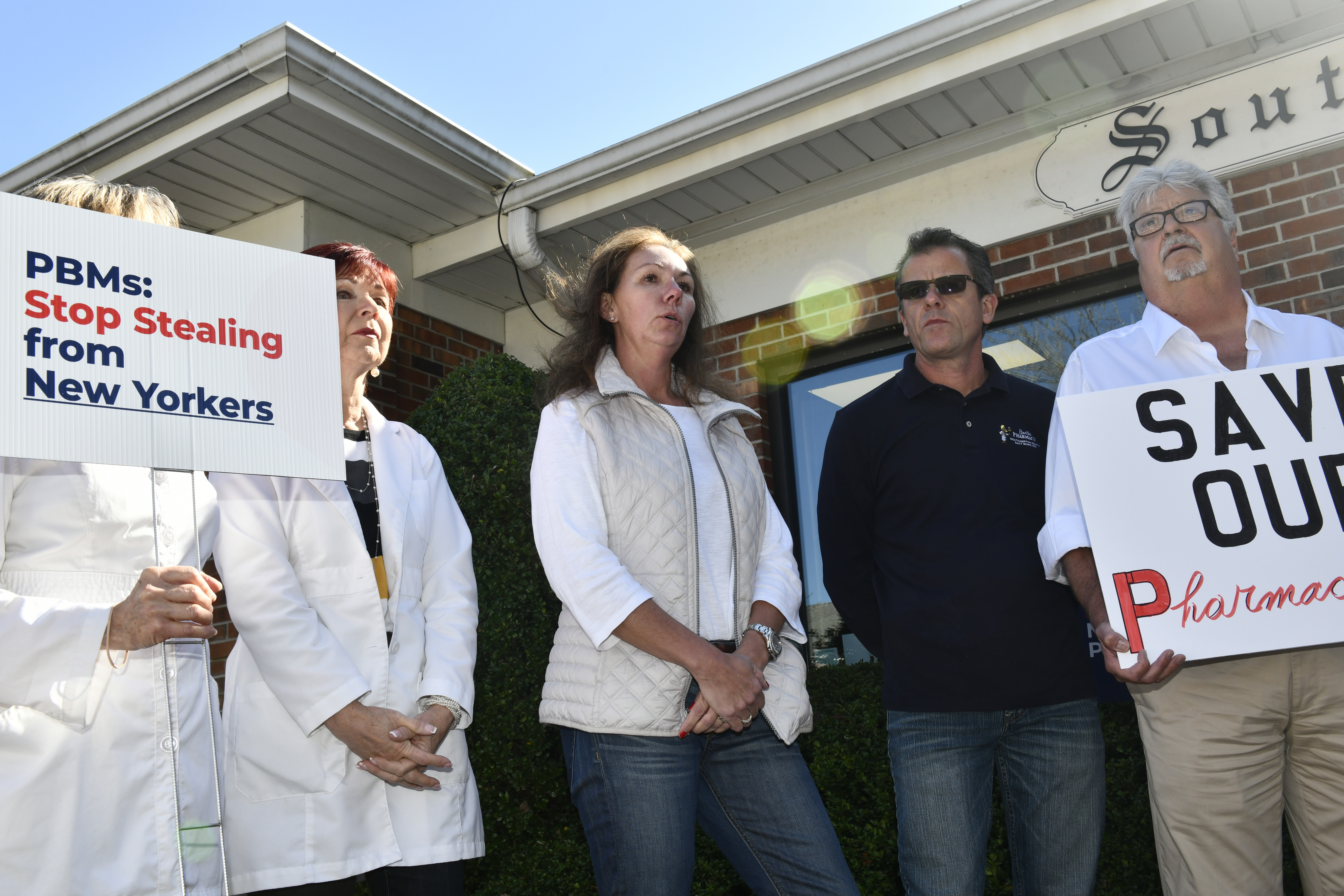 Sag Harbor Pharmacy owner Janice D'Angelo speaks at a rally against PBMs at Southrifty Drugs in Southampton Village on Wednesday, October 23. DANA SHAW