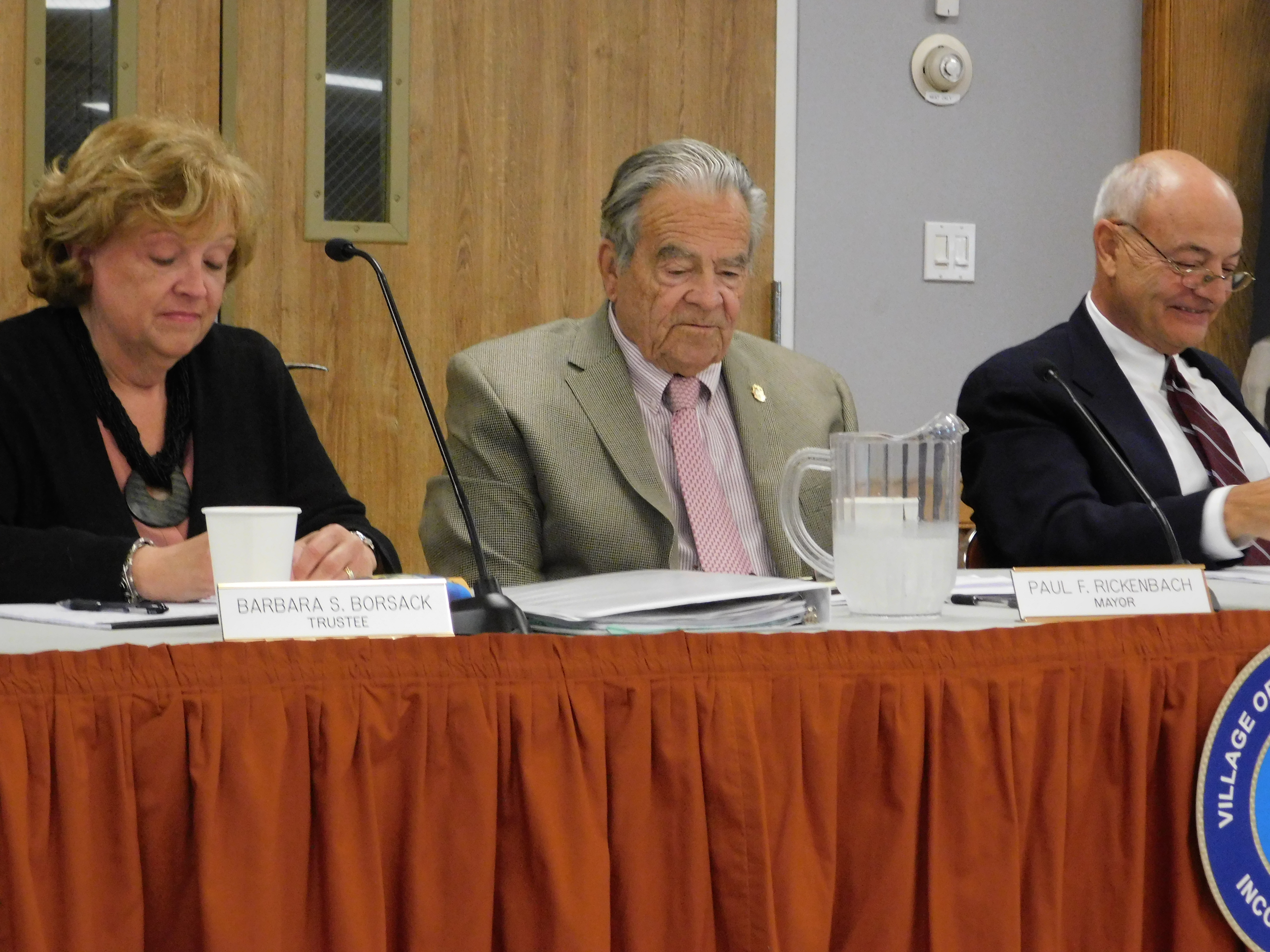 Barbara Borsack, Mayor Paul F. Rickenbach Jr, and Richard Lawler at a recent Village Board meeting. ELIZABETH VESPE