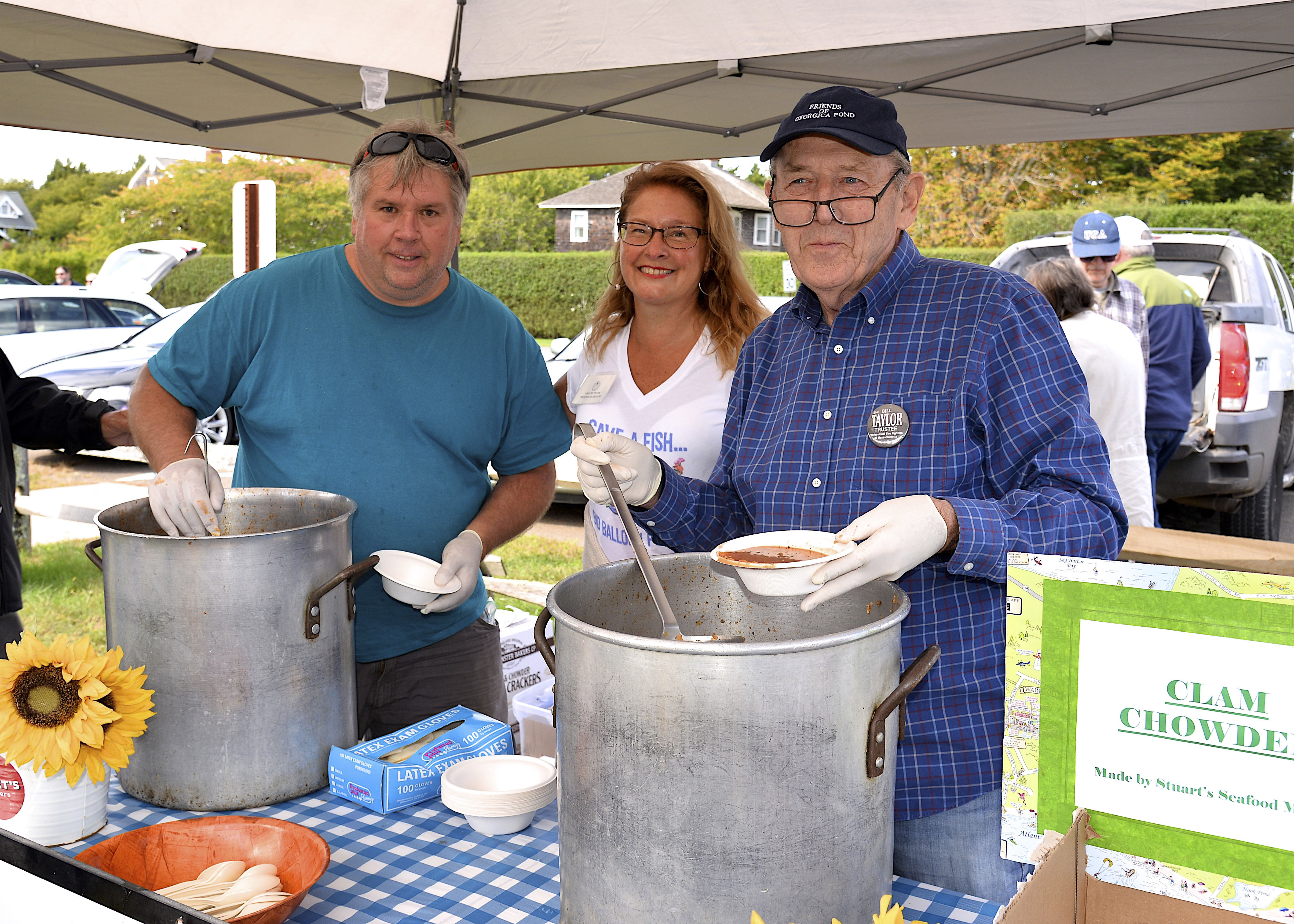 Michael Fromm, Arlene Tesar and Bill Taylor ladle out the chowder.