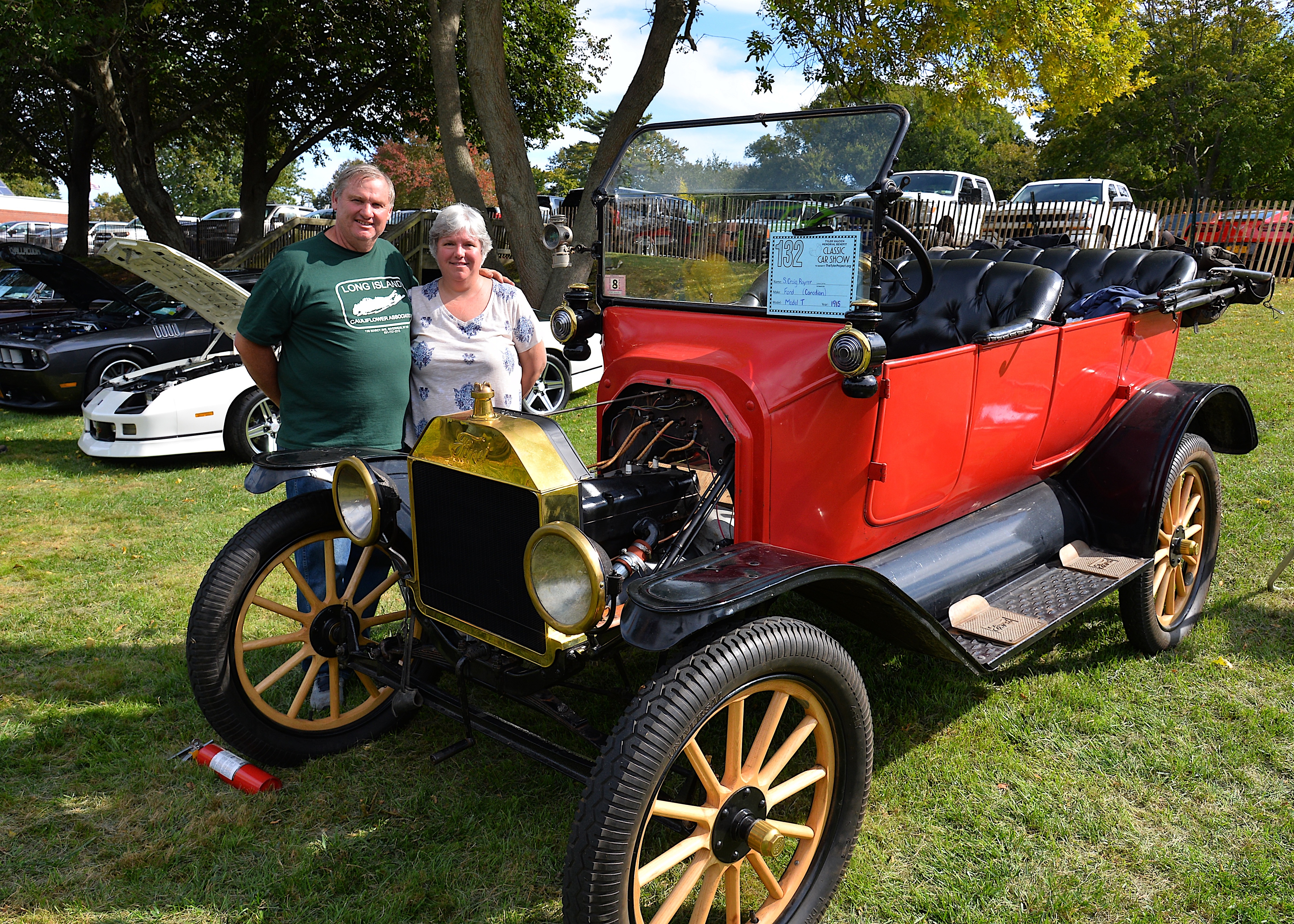 The sixth annual Tyler Valcich Memorial Car Show, to benefit the Tyler Project, was held on the grounds of the American Legion in Amagansett. Craig Raynor and Amy Page brought their 1915 Model T Ford. KYRIL BROMLEY