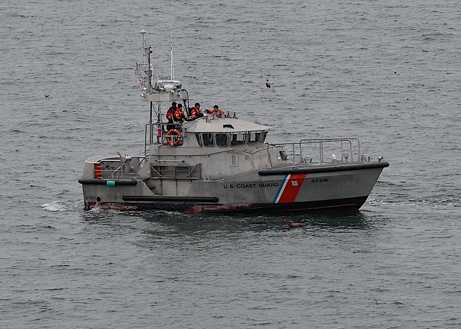 A Coast Guard boat offshore.