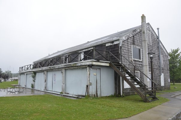 Southampton Town officials will contract Carter-Melence, Inc. to stabilize, lift and partially reconstruct the Tupper Boathouse in North Sea. GREG WEHNER