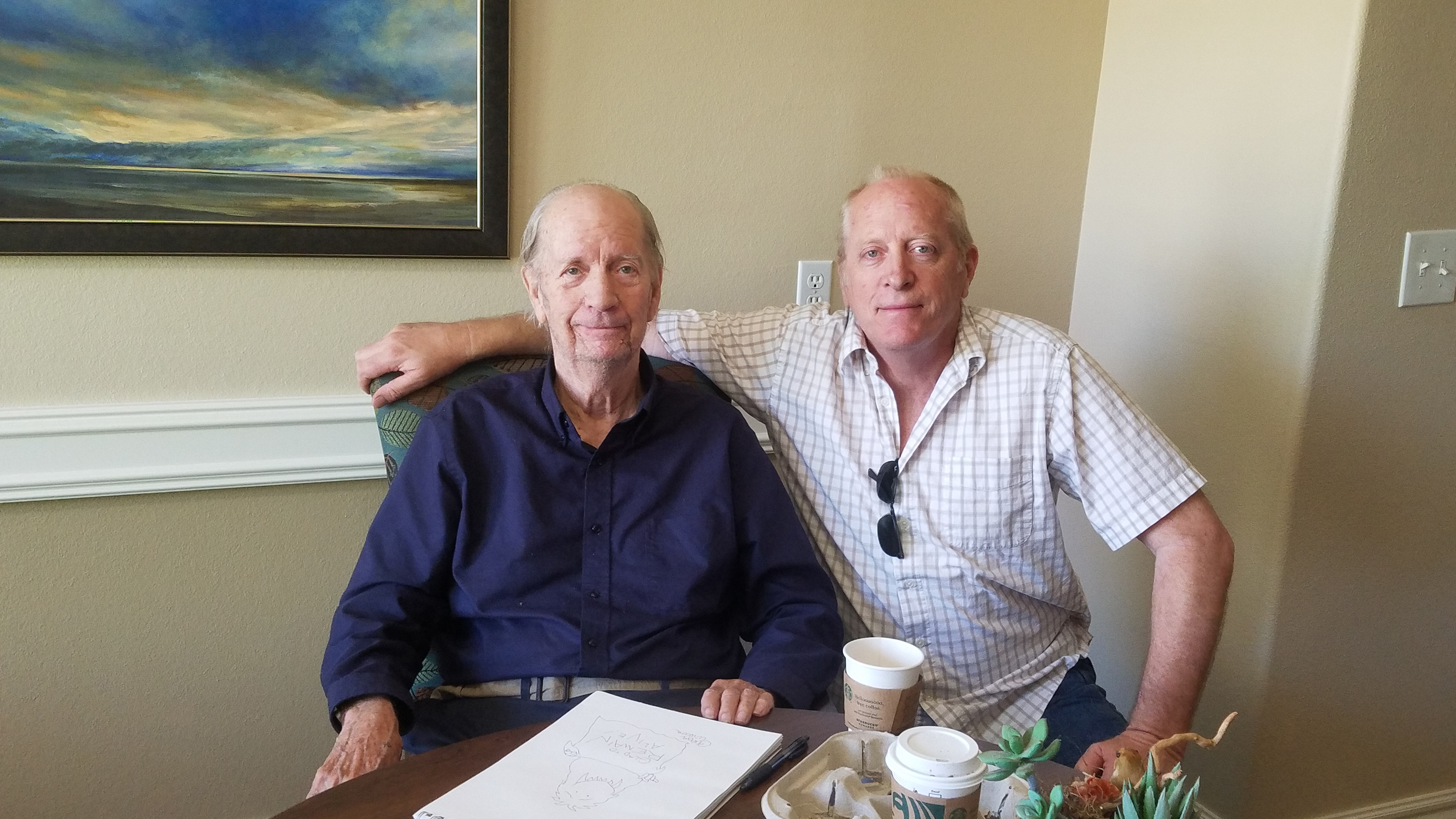 Gahan Wilson with his stepson, Paul Winters, at the memory care facility.
