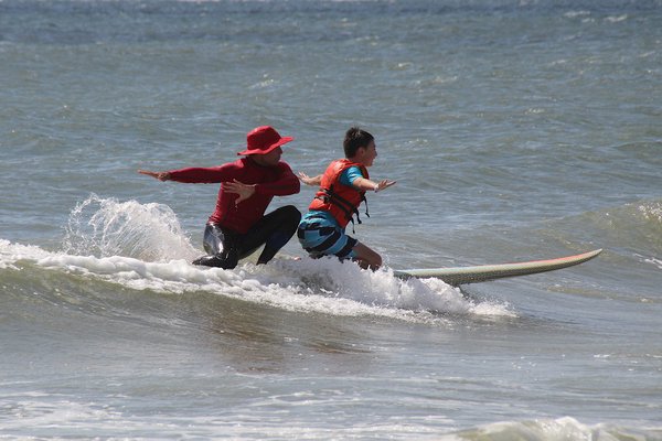 Surfers Healing, a California-based nonprofit that offers a day of surf camp for those with autism and other developmental disabilities, was at Ditch Plains in Montauk on Friday. The camp was underwritten by East End Disability Associates and receives volunteer support from the East Hampton Volunteer Ocean Rescue squad and the Montauk Lions Club. KYRIL BROMLEY