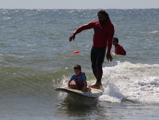 Surfers Healing, a California-based nonprofit that offers a day of surf camp for those with autism and other developmental disabilities, was at Ditch Plains in Montauk on Friday. The camp was underwritten by East End Disability Associates and receives volunteer support from the East Hampton Volunteer Ocean Rescue squad and the Montauk Lions Club. KYRIL BROMLEY