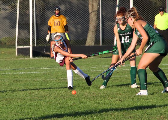 East Hampton freshman Chloe Coleman passes the ball.