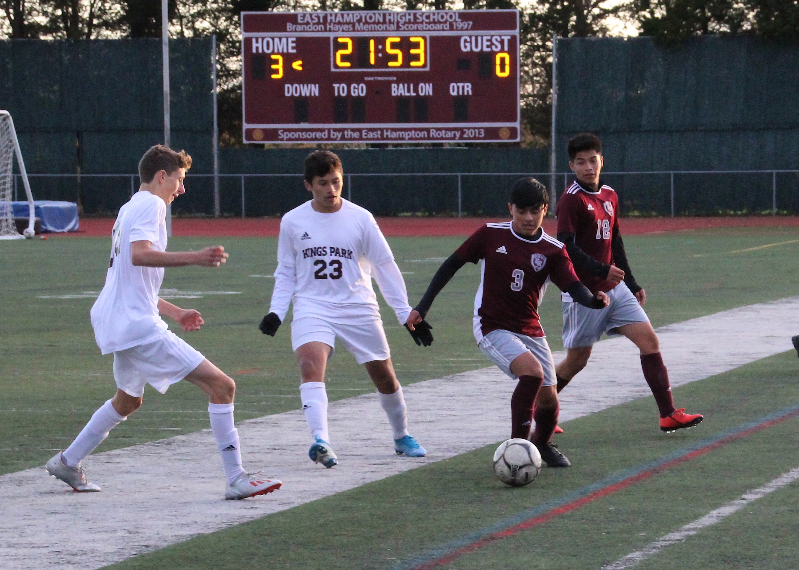 East Hampton junior Anthony Mermeo plays the ball with his team leading 3-0 in the second half.