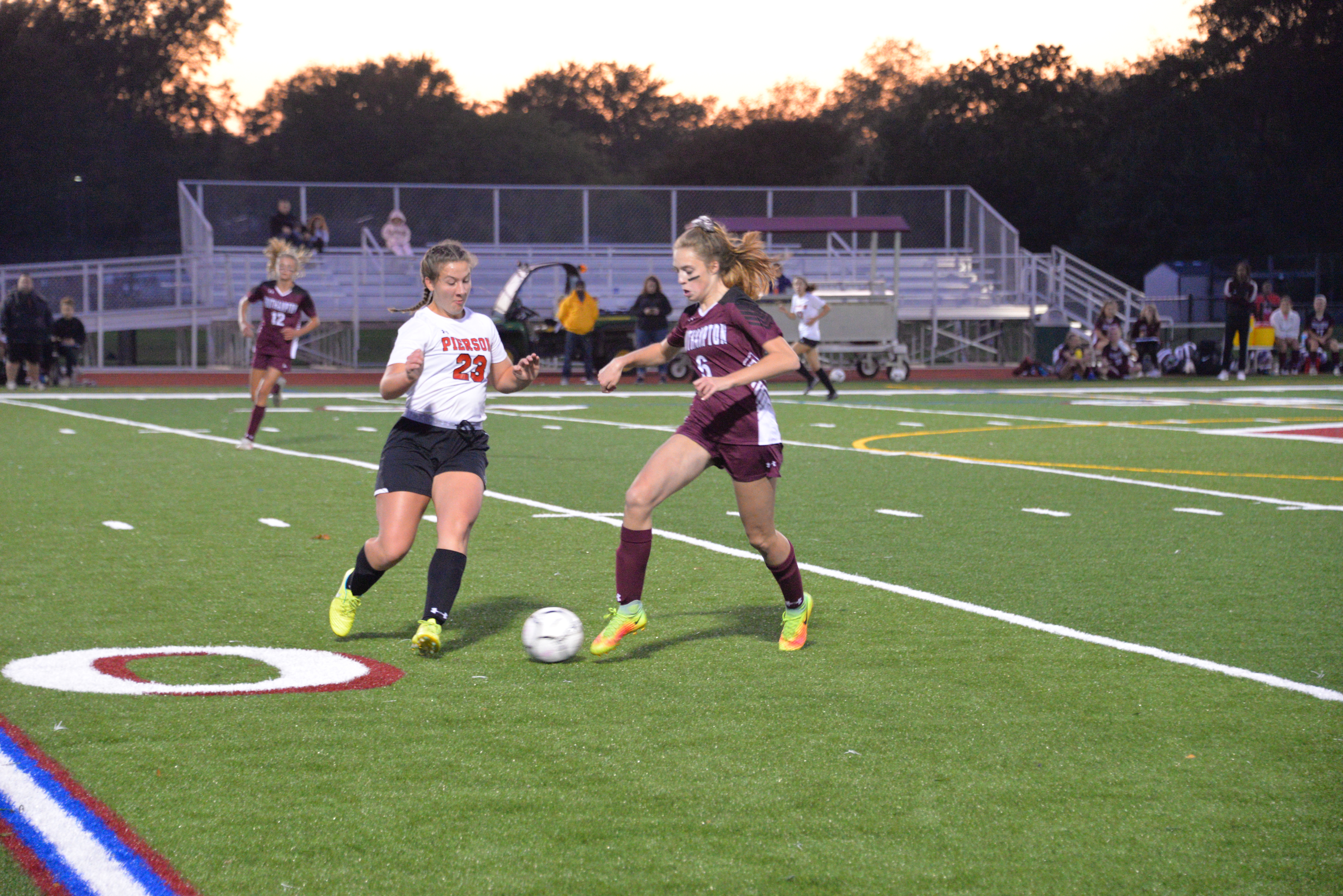 Southampton's Taylor Zukosky and Pierson's Elizabeth Hallock converge on the ball.