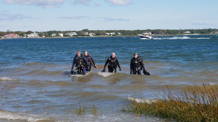 Southampton Town and the Long Island Divers Association held an underwater ribbon cutting at  Ponquogue Piers in Hampton Bays on Sunday, September 29.  According to the Long Island Divers Association, which did some research, this was the first underwater ribbon cutting on Long Island. Renovation of the Ponquogue Piers, the old Ponquogue Bridge, was recently completed. It was badly damaged during Super Storm Sandy in 2012. An above water ribbon cutting will be held at the South Pier on Friday, October 11th.