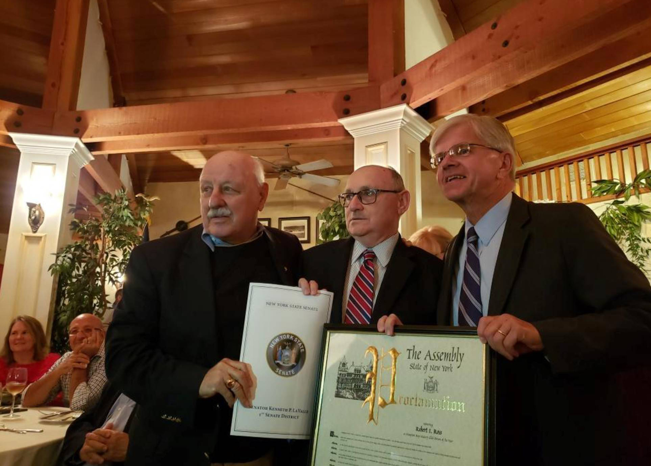 Robert I. Ross of Hampton Bays was recently recognized by the Rotary Club of Hampton Bays as their Outstanding Person of the Year at a cocktail reception at Oakland’s Restaurant. Mr. Ross was presented with proclamations from Senator Ken LaValle, Assemblyman Fred Thiele, Legislator Bridget Fleming and the Southampton Town Board, all of whom attended the event. He also received a Certificate of Special Congressional Recognition from Congressman Lee Zeldin. At the reception, the Rotary Club named Mr. Ross a Paul Harris Fellow. Mr. Ross, a former Southampton Town Deputy Supervisor, currently serves as Vice President of Community and Government Relations at Stony Brook Southampton Hospital and is a member of numerous Southampton Town committees. In addition, he is active with several local community organizations.