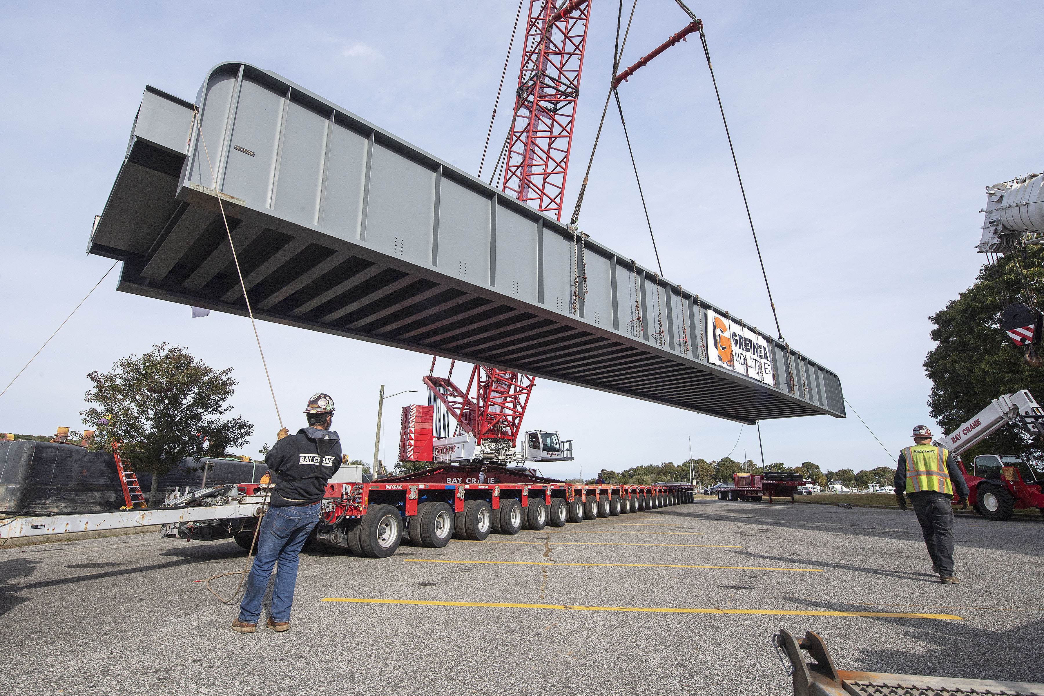 The new trestles were delivered through Shinnecock Inlet on Wednesday. They will be transported to East Hampton Village in the upcoming days. MICHAEL HELLER