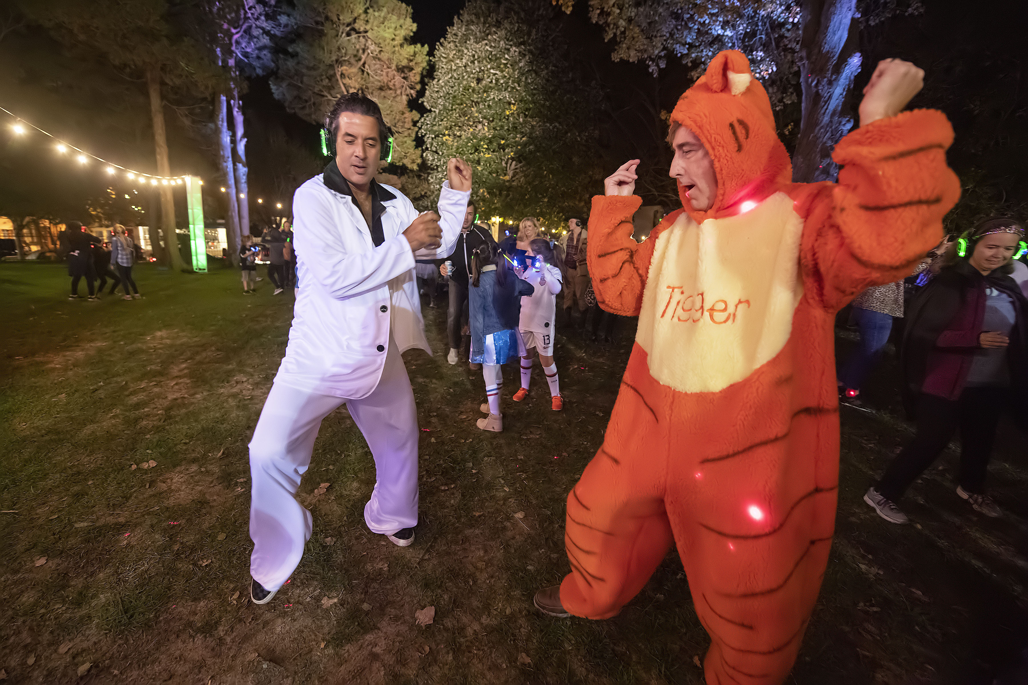 John Travolta and Tigger (aka Orson Cummings and Brian Darmody) rock out during the Halloween Silent Disco Party sponsored by the Southampton Arts Center on Saturday night.   MICHAEL HELLER