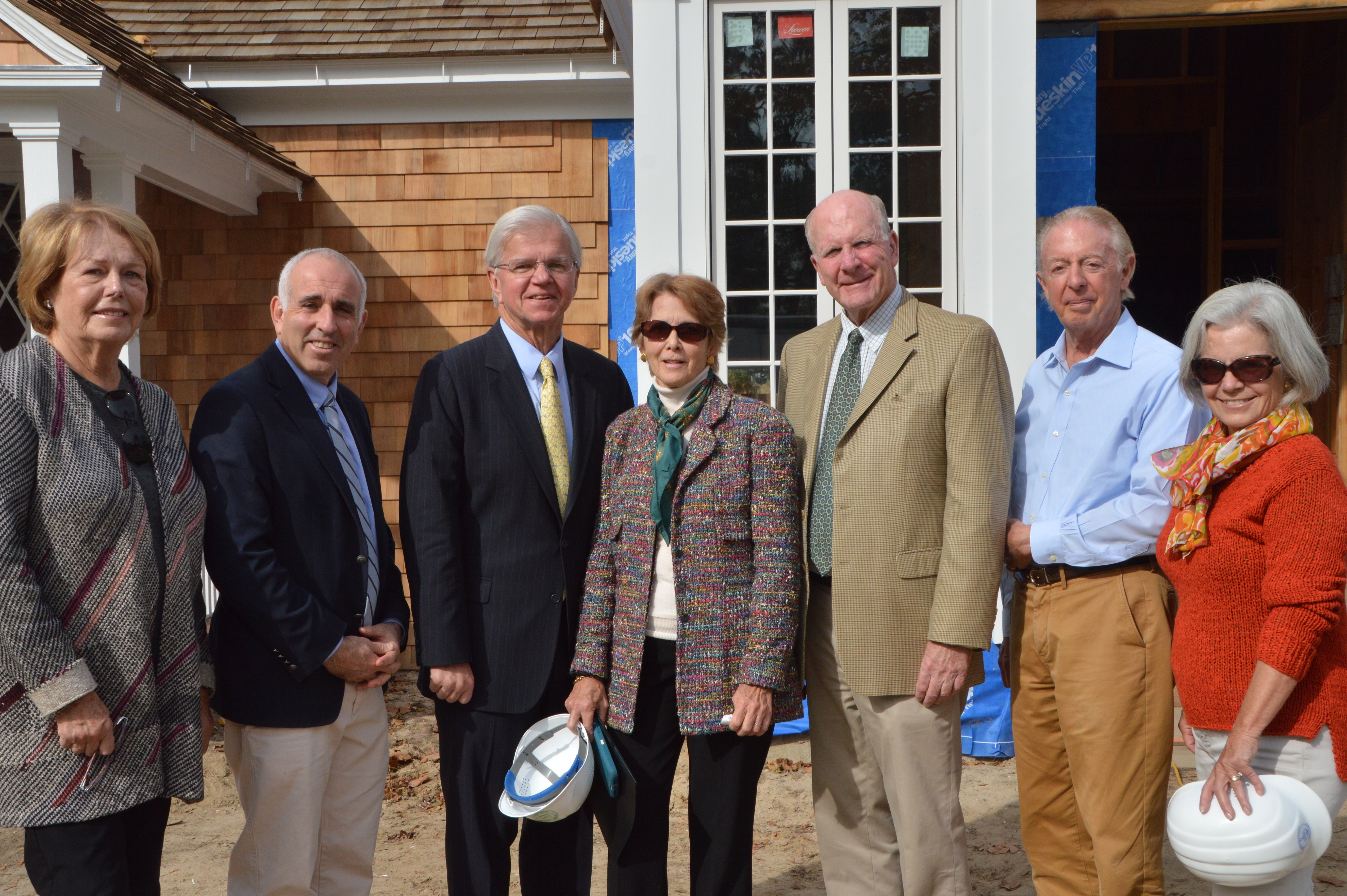 Local officials gathered recently to celebrat the halfway mark in the Quogue Library's renovation and expansion and the awarding of New York State construction grants to the project. From left, Quogue Library Building Committee representative Lynda Confessore, Southampton Town Supervisor Jay Schneiderman, New Yorks State Assemblyman Fred W. Thiele Jr., Quogue Libary Board and Building Committee President  Barbara Sartorius, Quogue Village Mayor Peter Sartorius and Paul Mejean and Sally McGrath, library trustees and members of the Building Committee.
