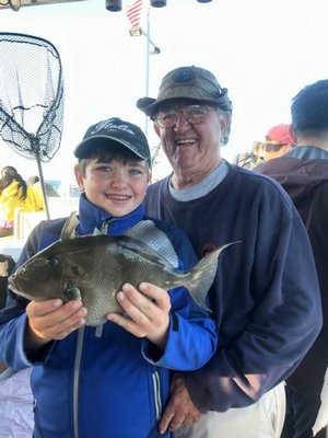 Aidan Murray got this big triggerfish while fishing aboard the Shinnecock Star out of Hampton Bays with his grandpa Bob.  Deena Lippman
