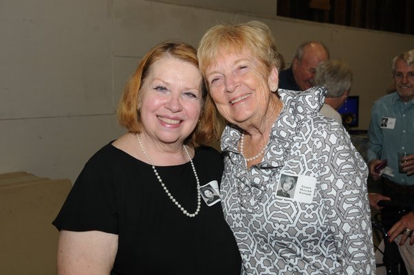 Members of the Southampton High School Class of 1964 gathered for their 55th annual reunion on Saturday at the WAter Mill Community Club's field house. Georgette Chapek, left, and Sandy Muller Raynor organized the event. RICHARD LEWIN