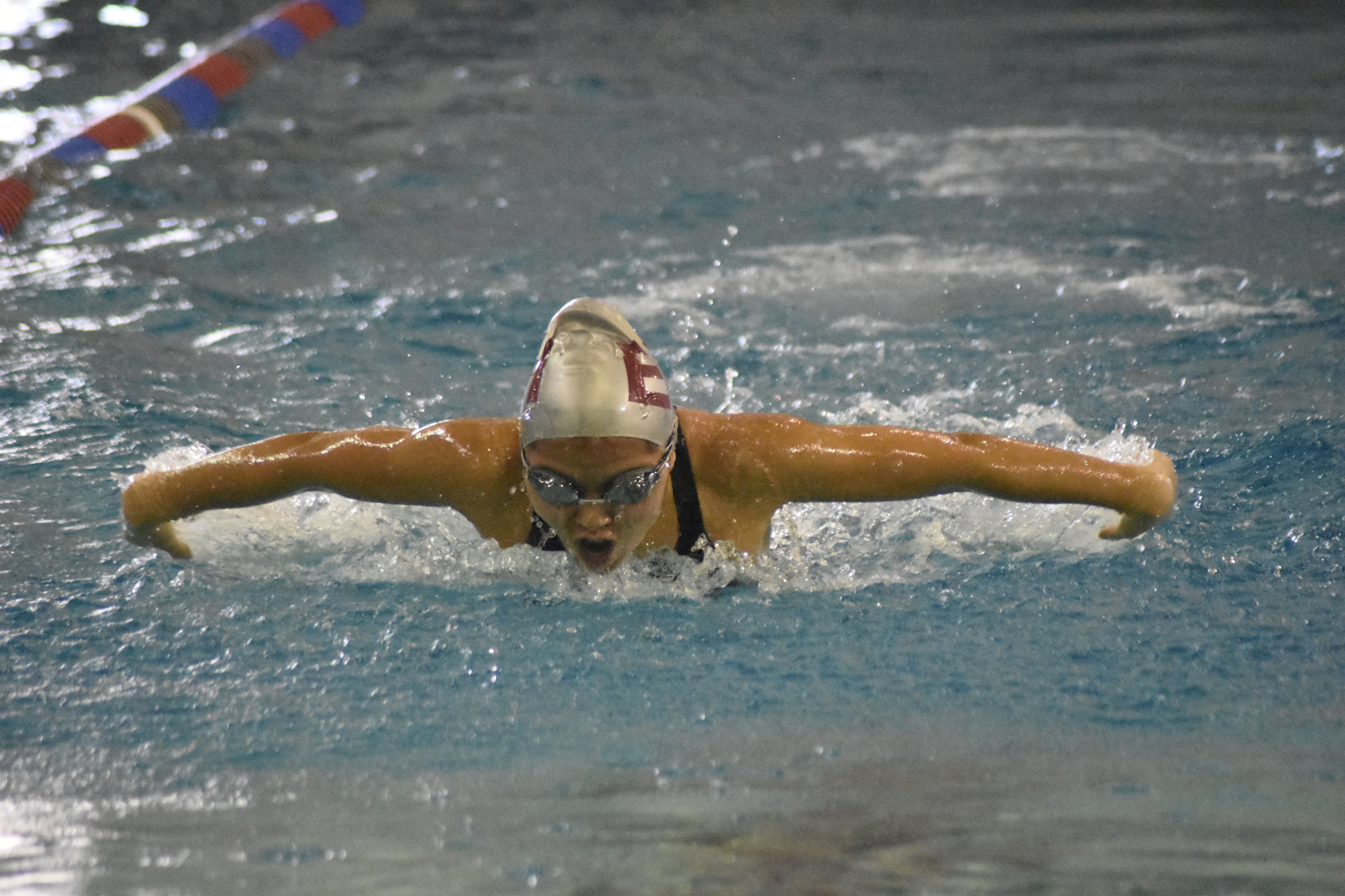 East Hampton senior Darcy McFarland in the 100 fly.