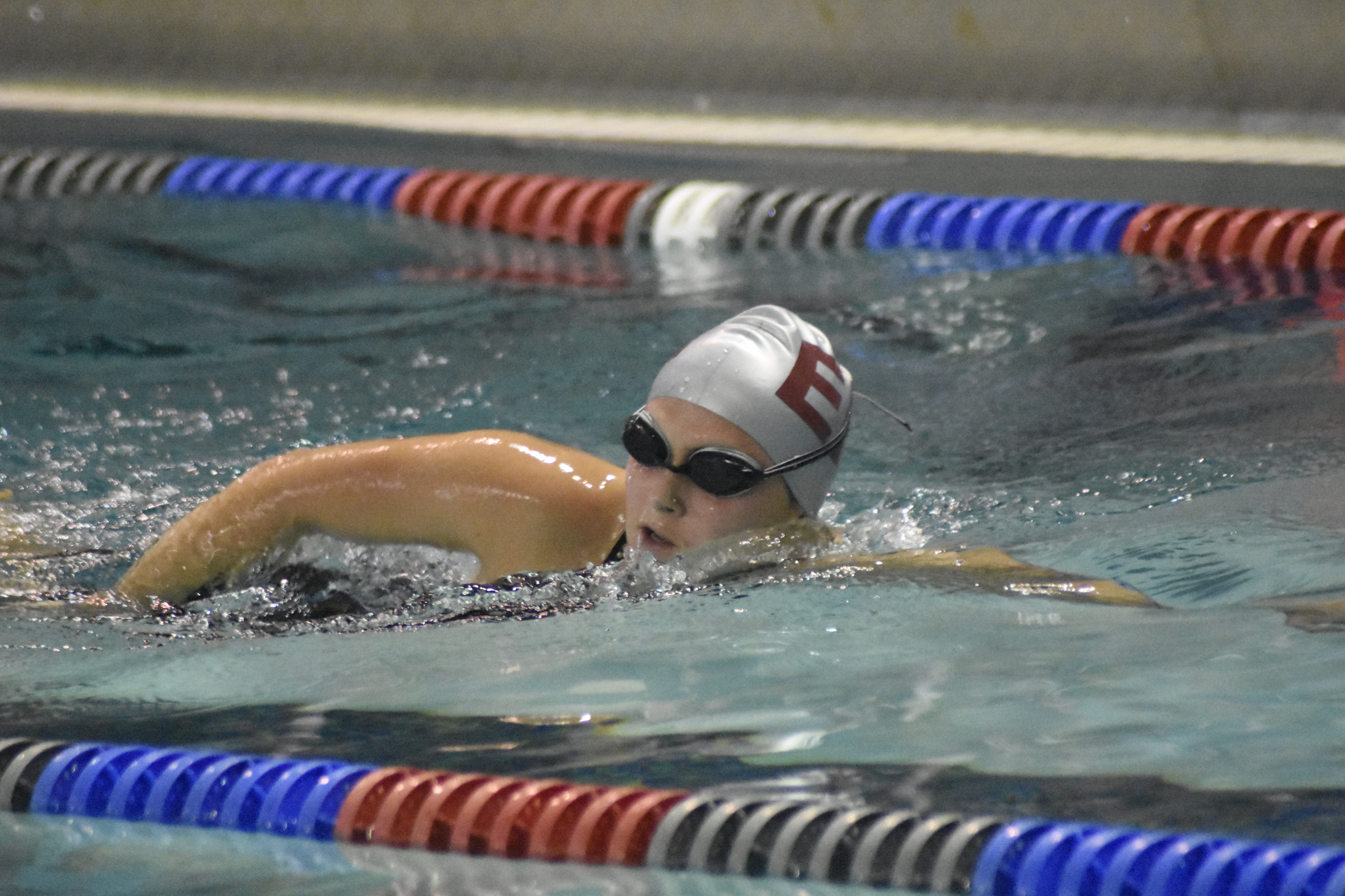Senior Sophia Swanson placed third in the 100 freestyle and helped East Hampton relay teams perform well.  DREW BUDD