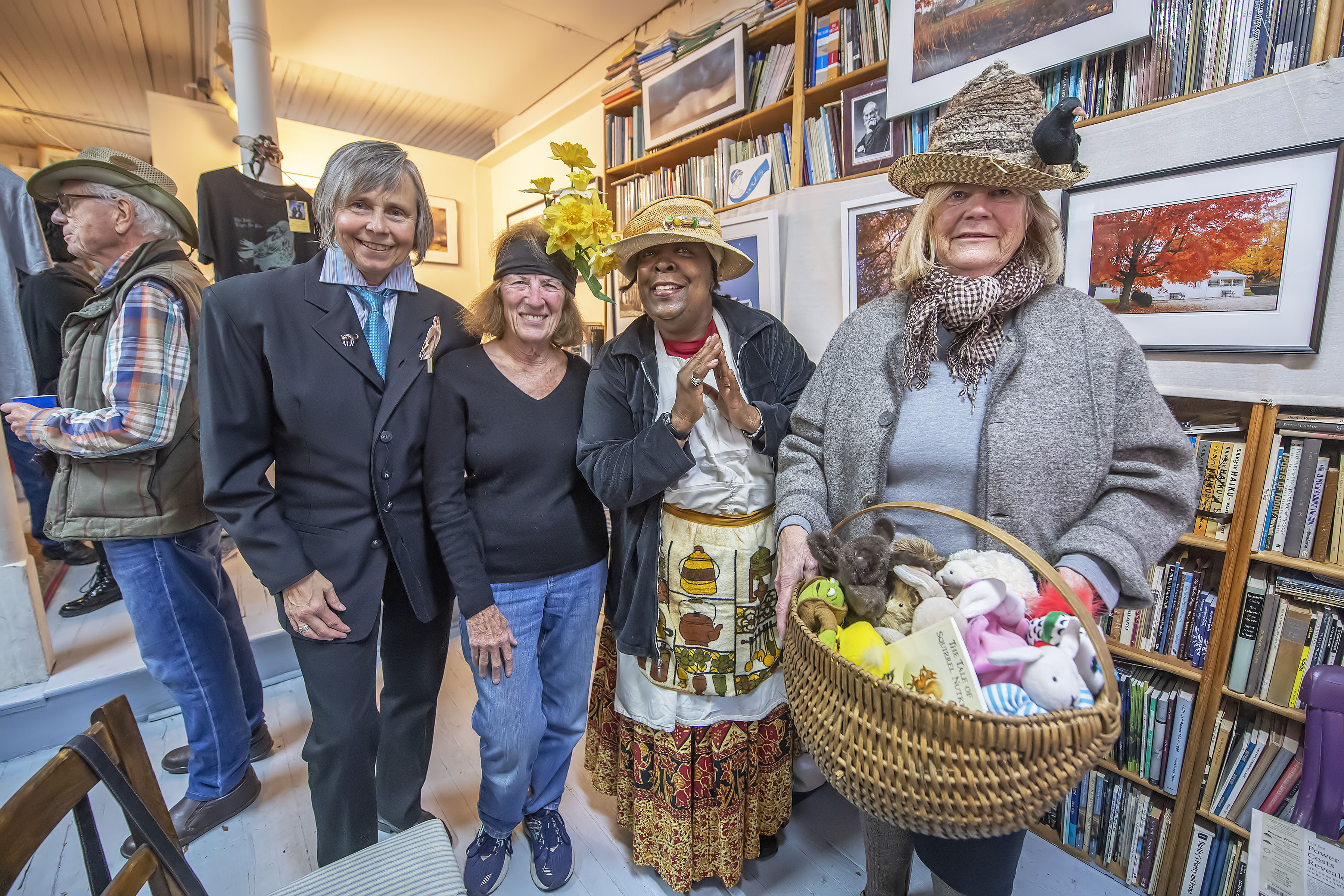 Kathryn Szoka, Joan Baum, Lora Tucker and Sigrid Meinel (aka Donna Tartt, a William Wordsworth Poem, Celie (from The Color Purple) and Beatrice Potter) during a Come-As-Your-Favorite-Author Halloween Party at Canio's Bookstore on Saturday night.  MICHAEL HELLER