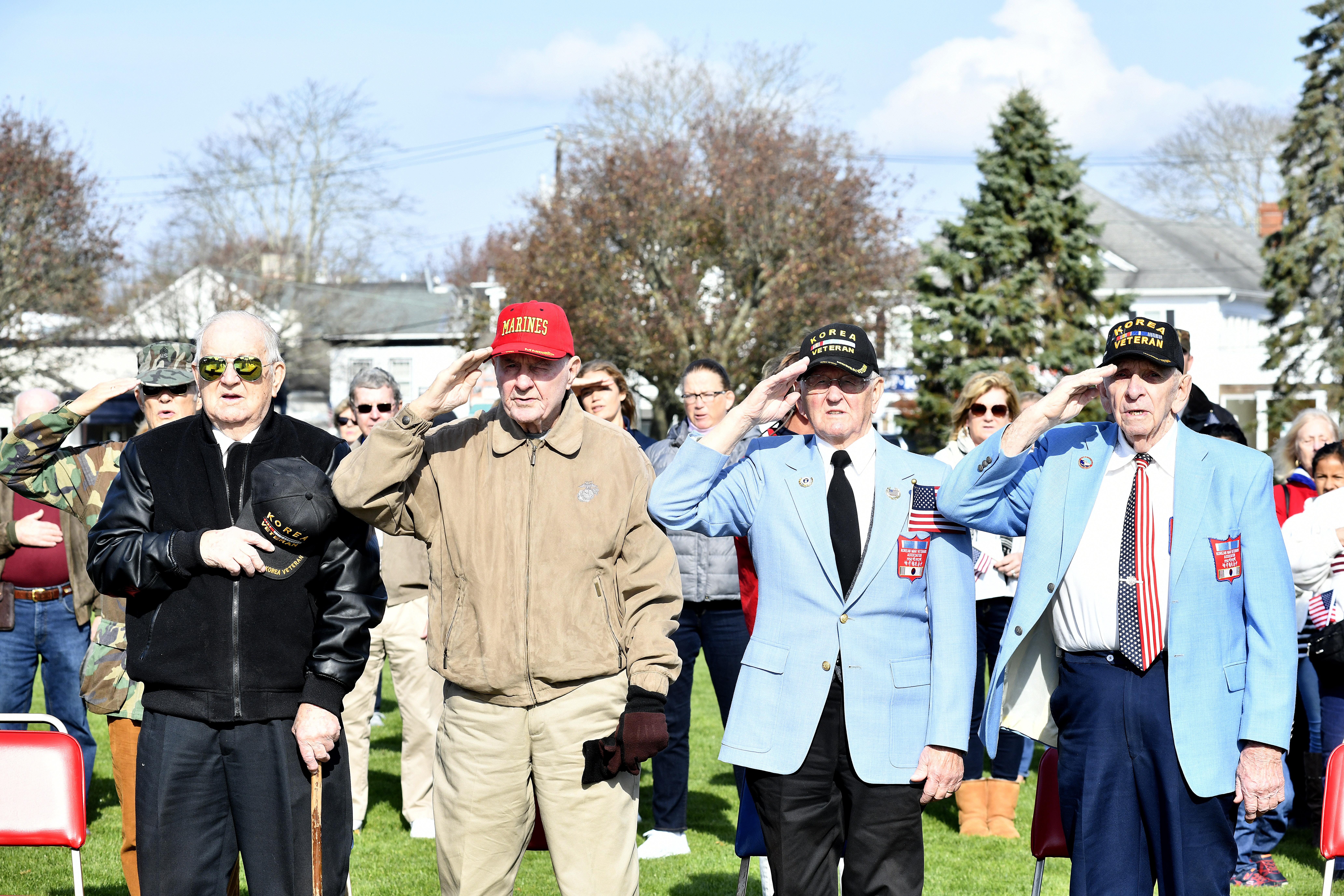 Korean War Veterans Frank Kandula,  Joe Brady, Stanley Penski and Ray Tureski at the Veterans Day ceremony in Agawam Park in Southampton Village on Monday. DANA SHAW