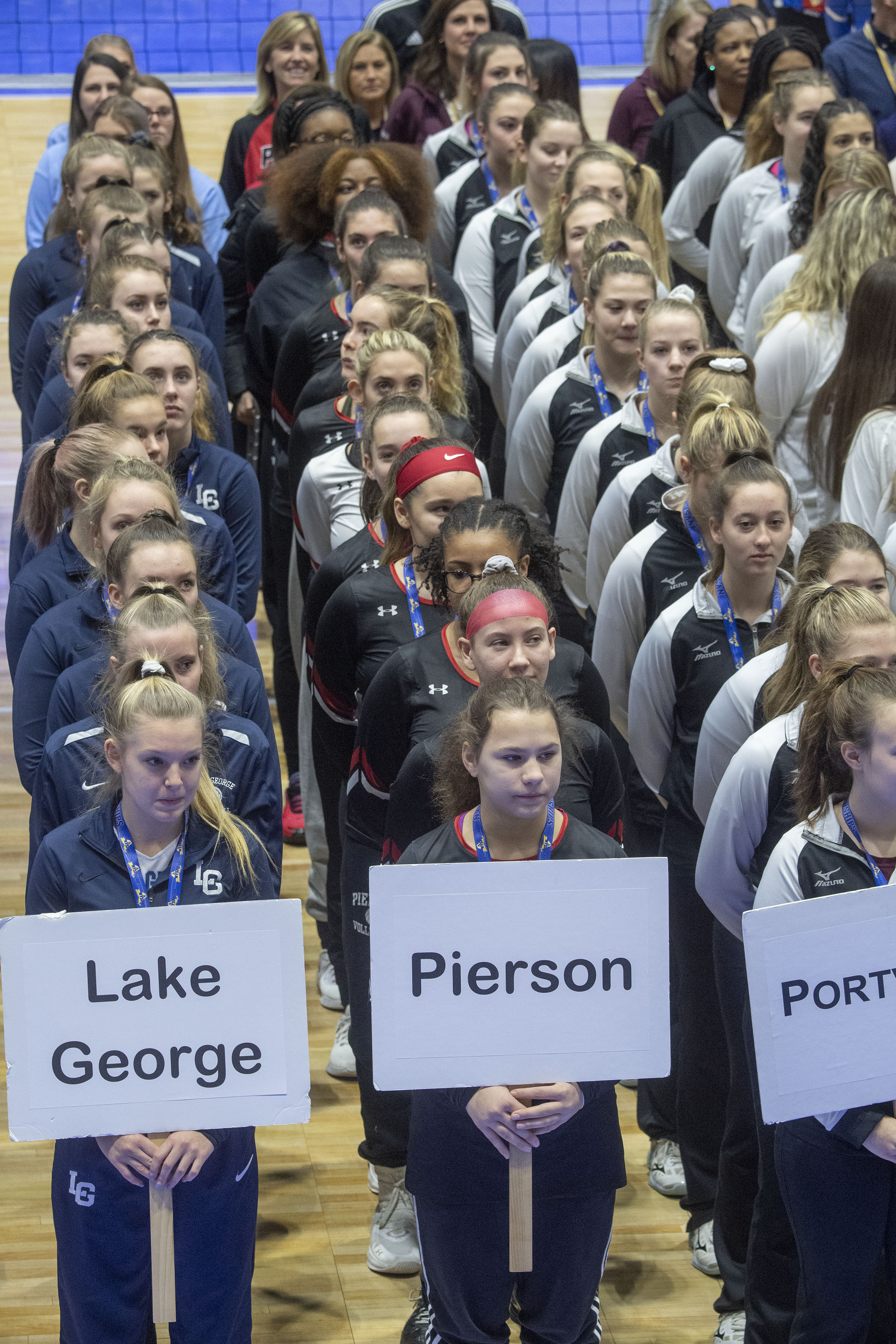 The Pierson/Bridgehampton girls volleyball team during the opening ceremony of the New York State Championships at Cool Insuring Arena in Glens Falls on Saturday morning.