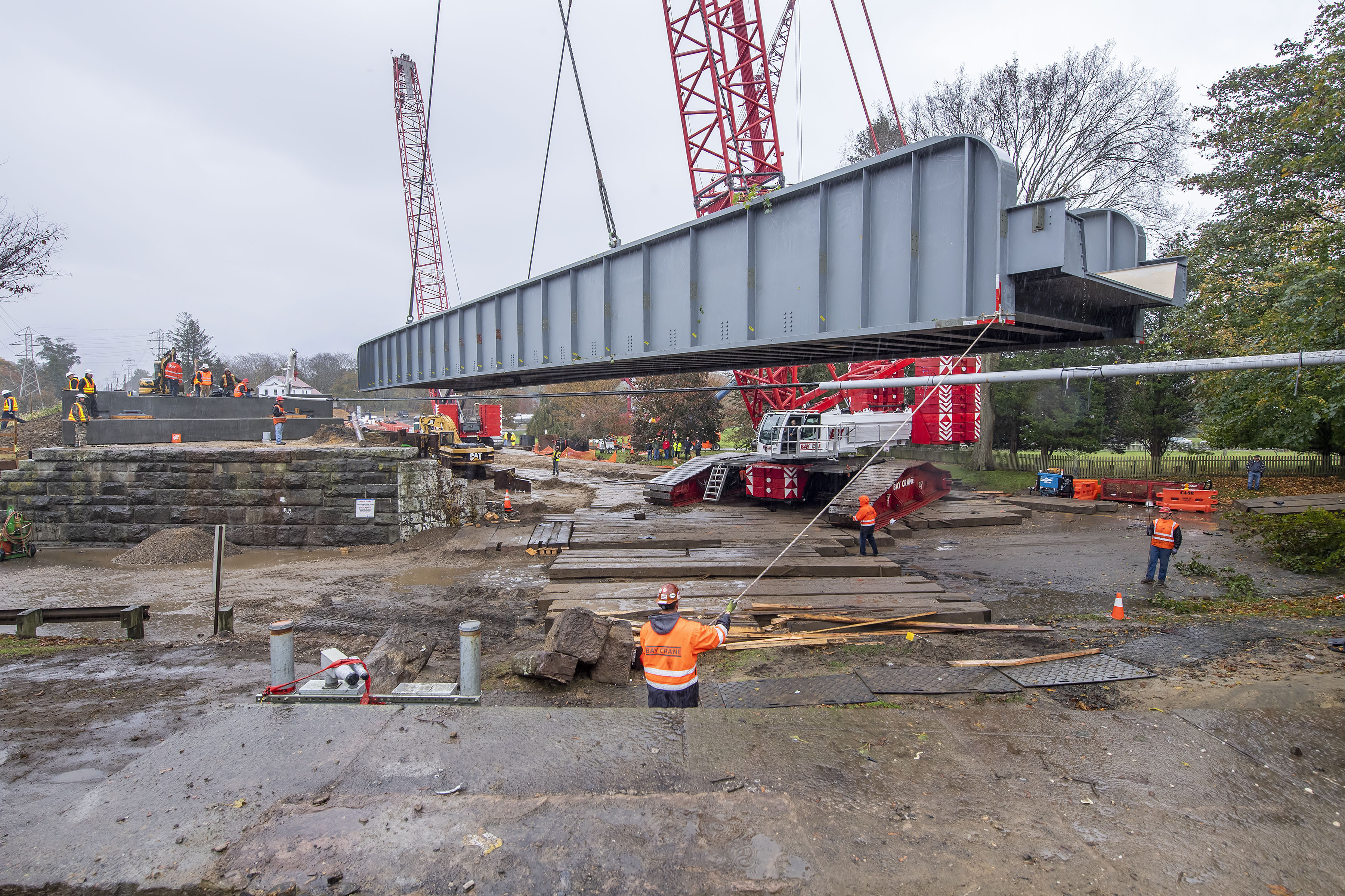 The new railroad trestle is moved into place at the crossing over Accabonac Road by the Bay Crane company during the project to replace the two aging Long Island Railroad trestles at North Main Street and Accanobac Road in East Hampton