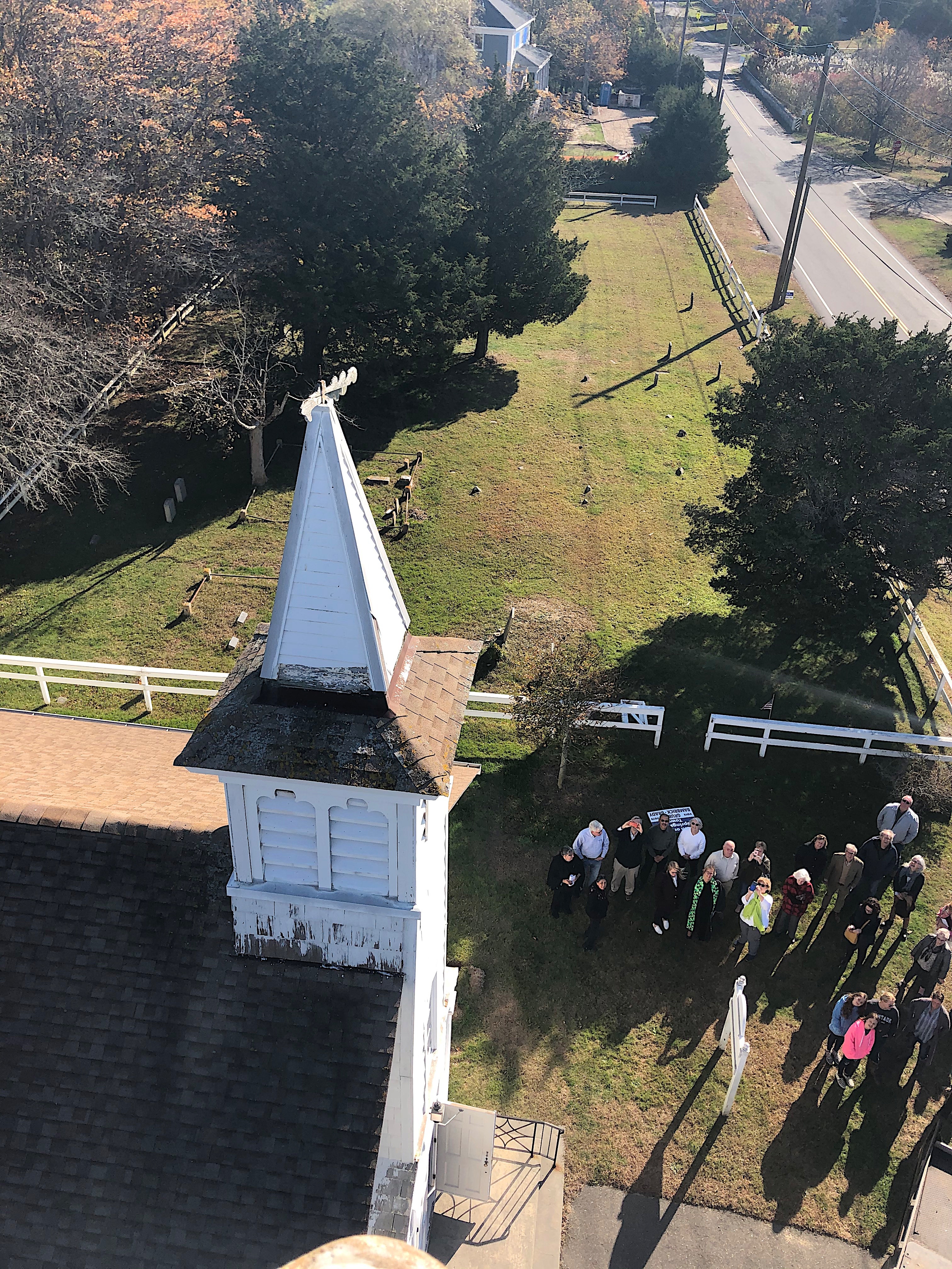 With assistance from Don Chambers of Timberworks who brought his cherry-picker, Ricky Muller removed the 137-year-old wooden windvane from the steeple of Springs Community Presbyterian Church on Sunday morning. A new windvane will be installed. KYRIL BROMLEY 