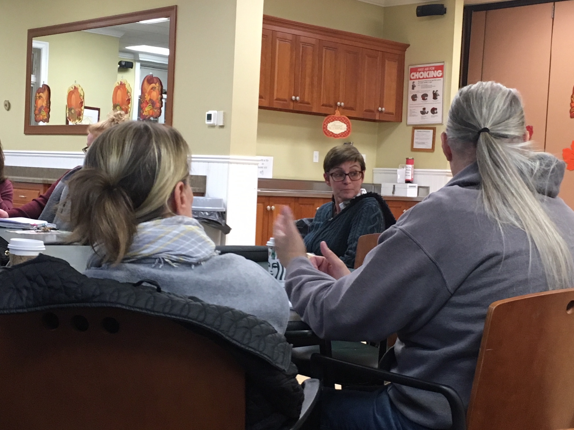 Southampton Town Councilwoman Julie Lofstad istens as John Cerrato offers a comment at the Hampton Bays Citizens Advisory Committee meeting. 