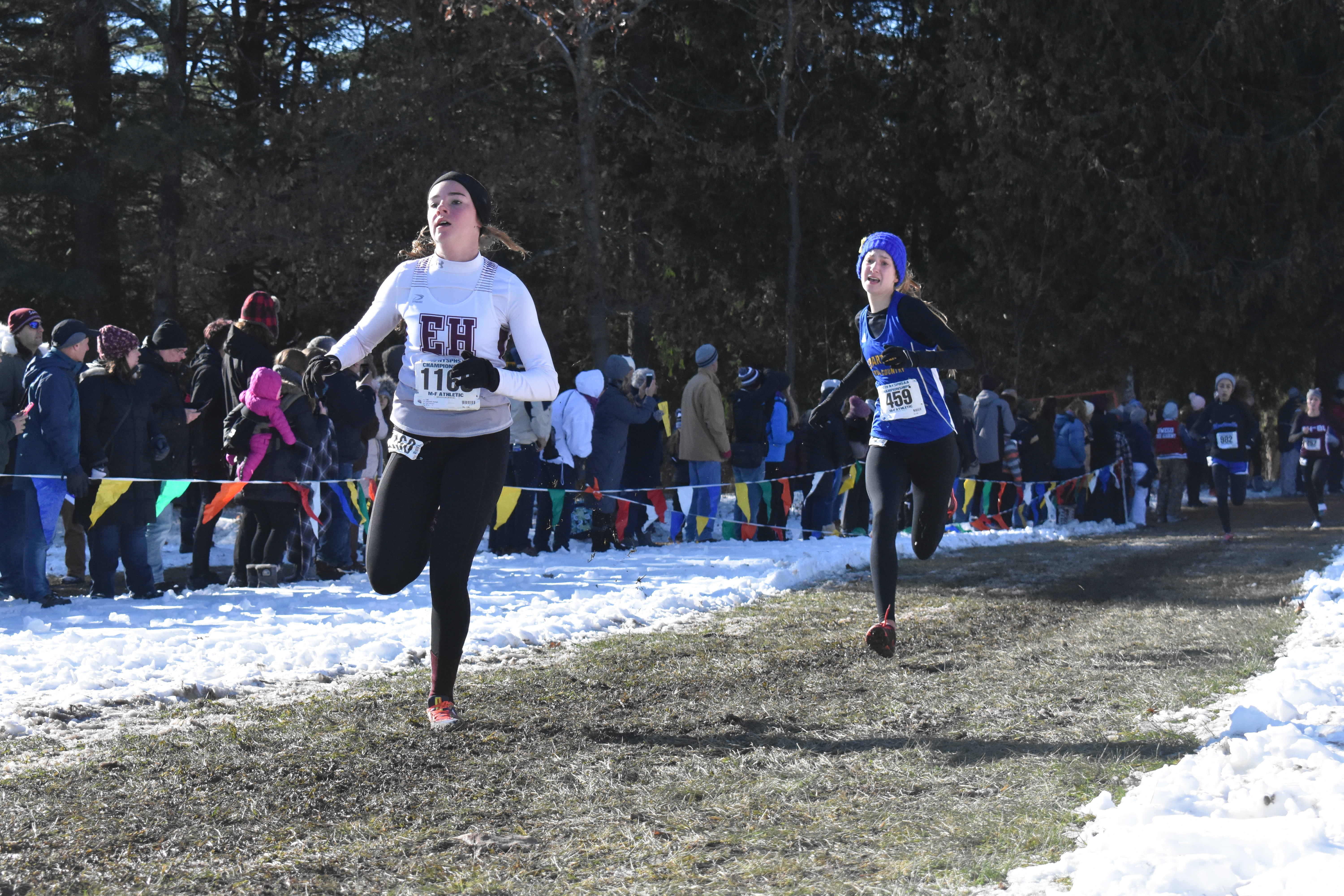 East Hampton's Ryleigh O'Donnell reaches the finish line.