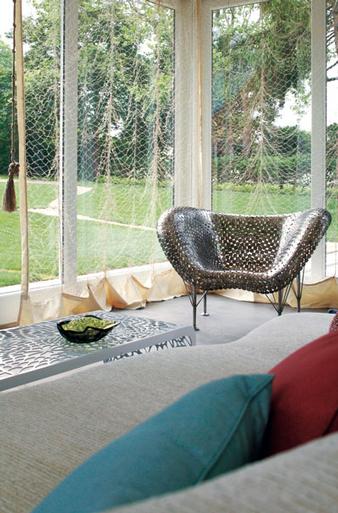 The Kennedy half-dollar chair and fish net wall hangings featured in Mr. Platt's design. COURTESY HG&C