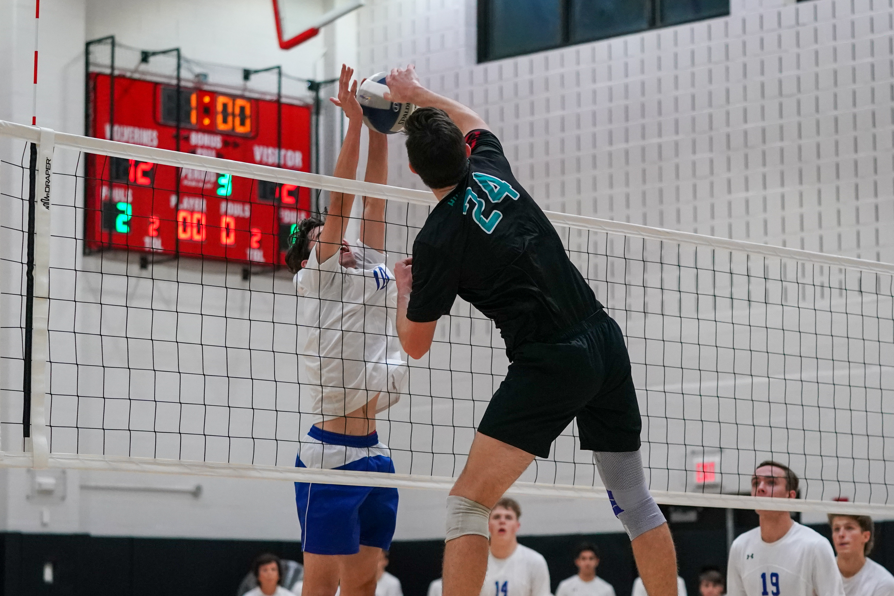 Westhampton Beach junior Ryan Barnett slams down a kill.