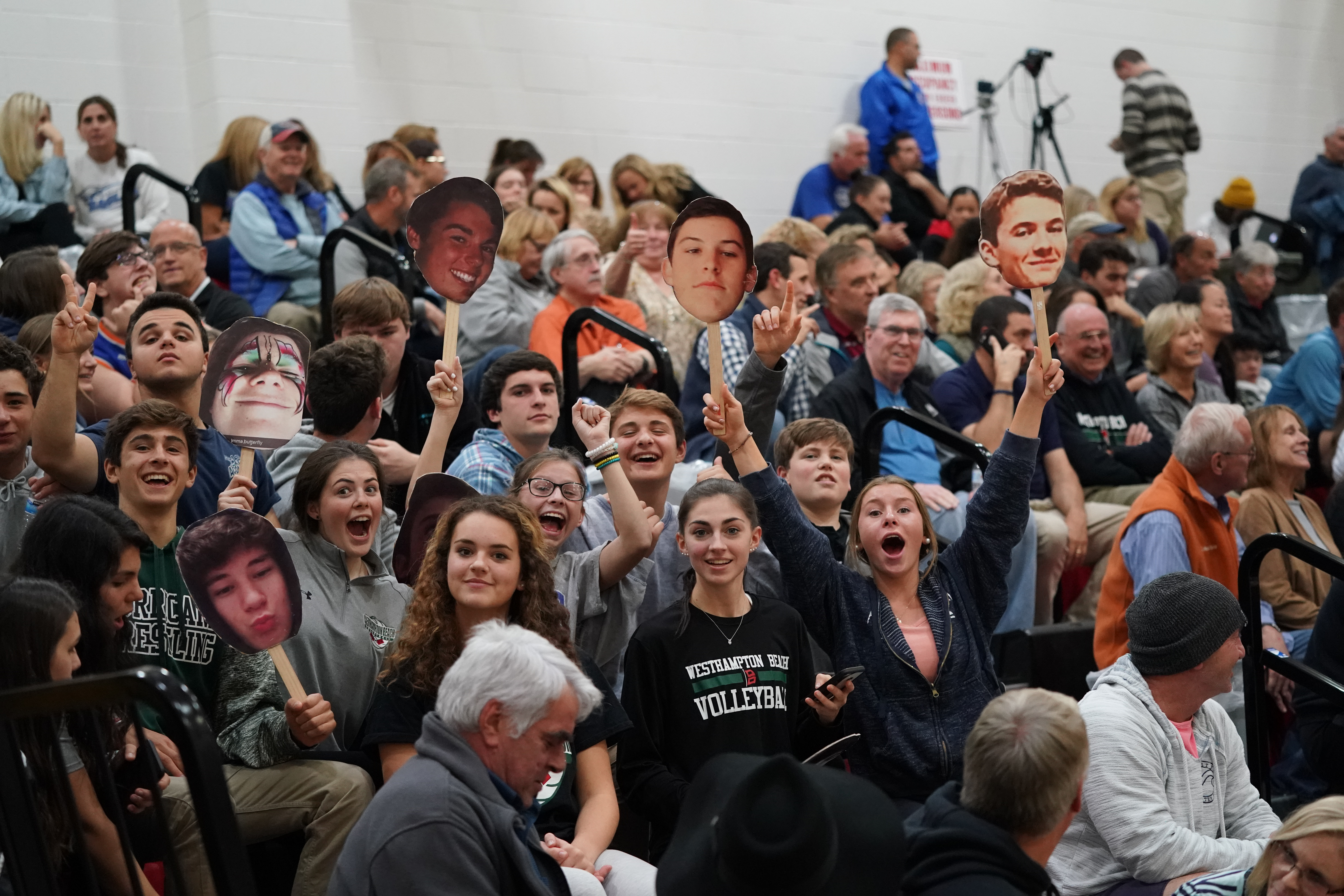 Westhampton Beach fans and family support the team at Monday's county final.