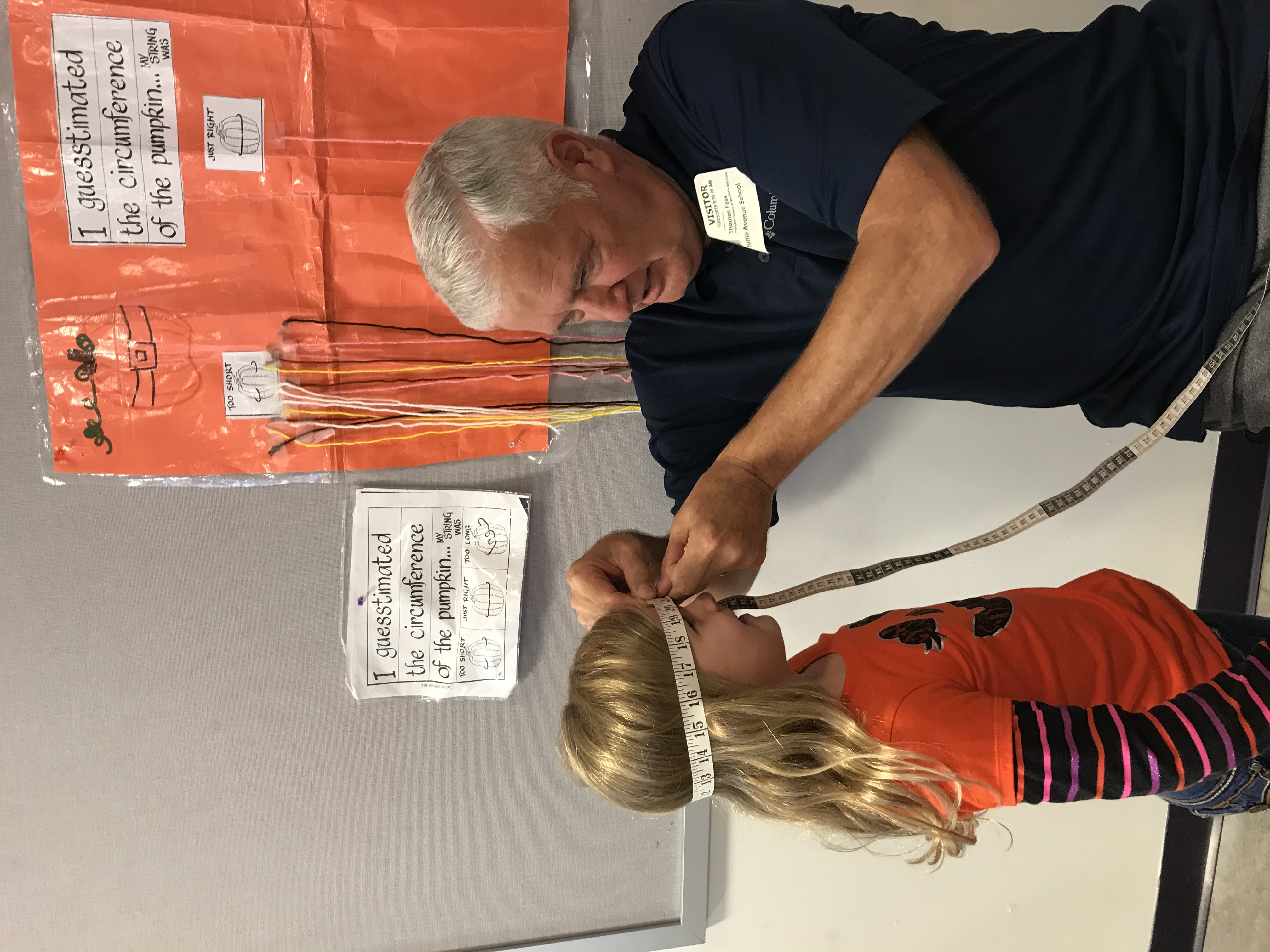 Tuttle Avenue Elementary students collecting data and creating art with their pumpkins. 
