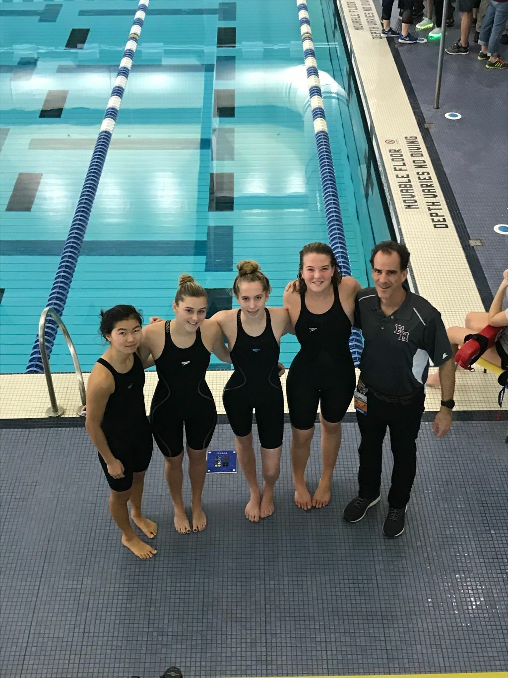 Lady Bonackers, from left to right, Darcy McFarland, Sophia Swanson, Jane Brierley and Julia Brierley and head coach Craig Brierley.