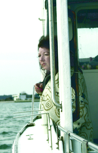 Susan Legotti on board the Shinnecock Star in Tiana Bay during the search for her son Marc in March of 2001. PRESS FILE