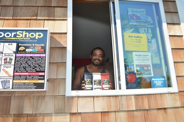 Arnay Terry sells Thunder Island coffee at his shop. ALISHA STEINDECKER