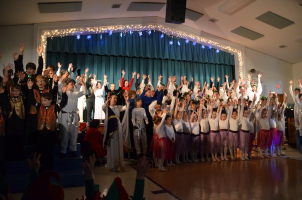 Our Lady of the Hamptons students perform
