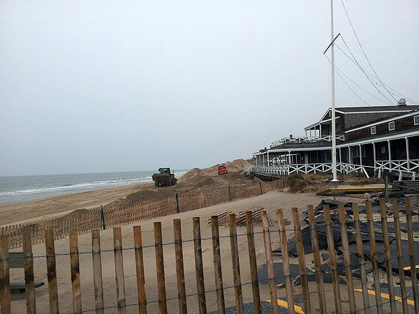 Contractors shored up the beach in front of the East Hampton Main Beach pavilion last week. VIRGINIA GRIFFITHS