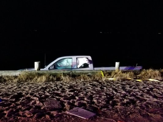 An elderly man drove a pickup truck into Mecox Bay from Flying Point Road on Thursday night. GREG WEHNER