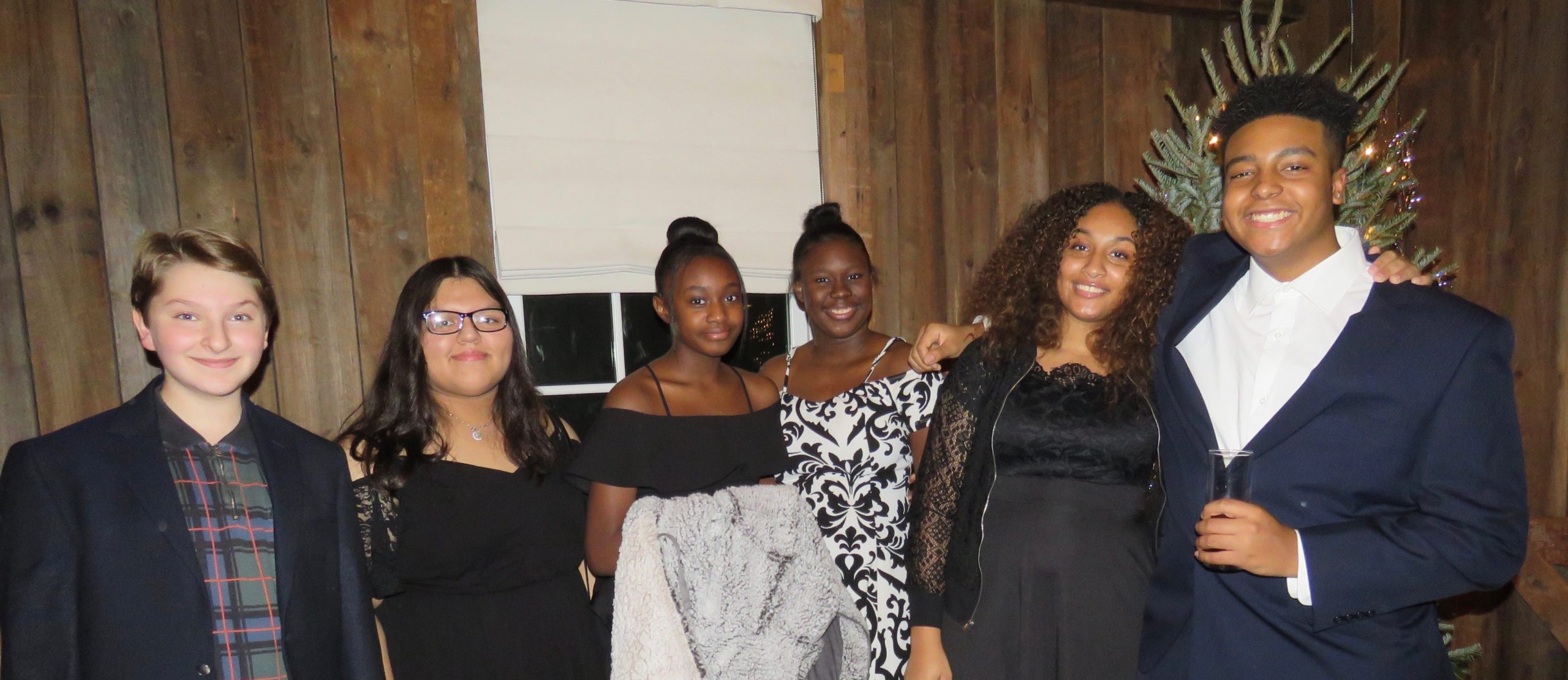 The Bridgehampton Childcare and Recreational Center held its annual holiday fundraising dinner at the Topping Rose House in Bridgehampton on December 15.  Among those attending were Sivia Loria and Bonnie Michelle Cannon, right, and a group of supportive teens. 