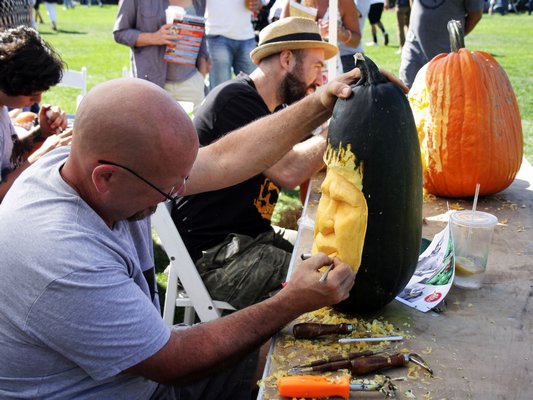 The Maniac Pumpkin Carvers at work.